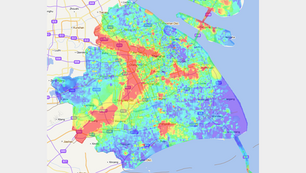 Heatmap of Signal Coverage in Shanghai A heatmap displaying signal coverage across Shanghai and surrounding regions. The map uses a color gradient from red (strong signal) to blue (weak or no signal). Central Shanghai shows dense red areas indicating strong network coverage, while outskirts and coastal areas display weaker coverage in blue and green.